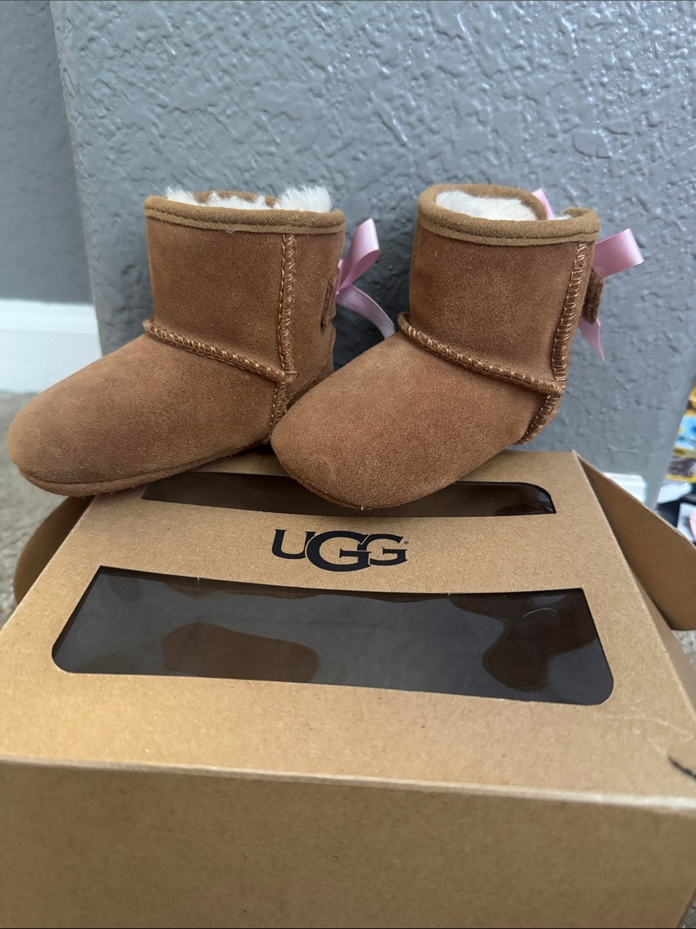 UGG Chestnut Suede Infant Booties with Pink Bow. Used.